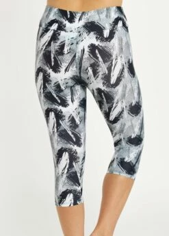 Daphne Loose Fit Swim Top With Capri Swim Leggings -Calypsa Sales 062222 calypsa 0765 modli cropped 135 183 2118 2956 3